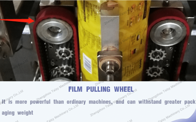 film pulling wheel